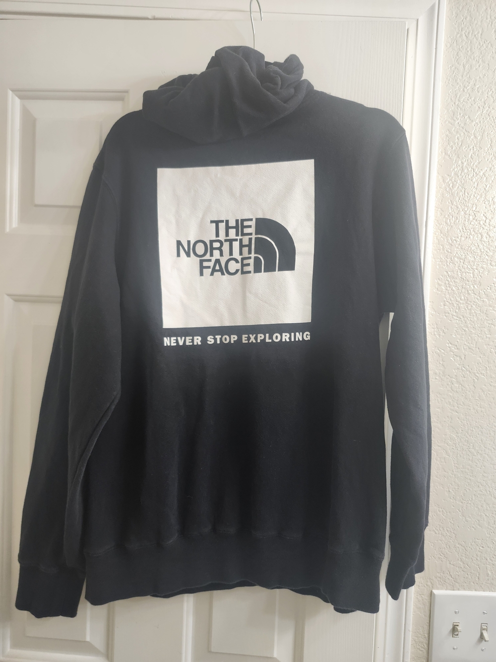 The North Face Men's Black Logo Hoodie - Never Stop Exploring